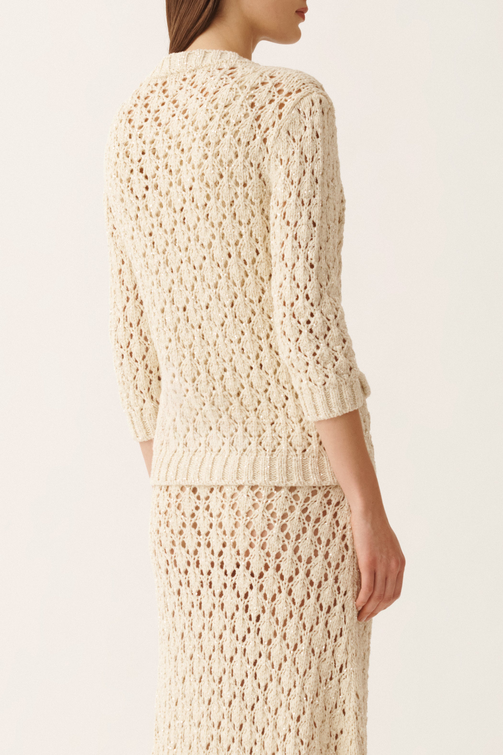 Paillettenbesetzte, rautenförmige Strickjacke mit kurzen Ärmeln