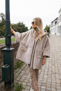 Reversible merino shearling cape