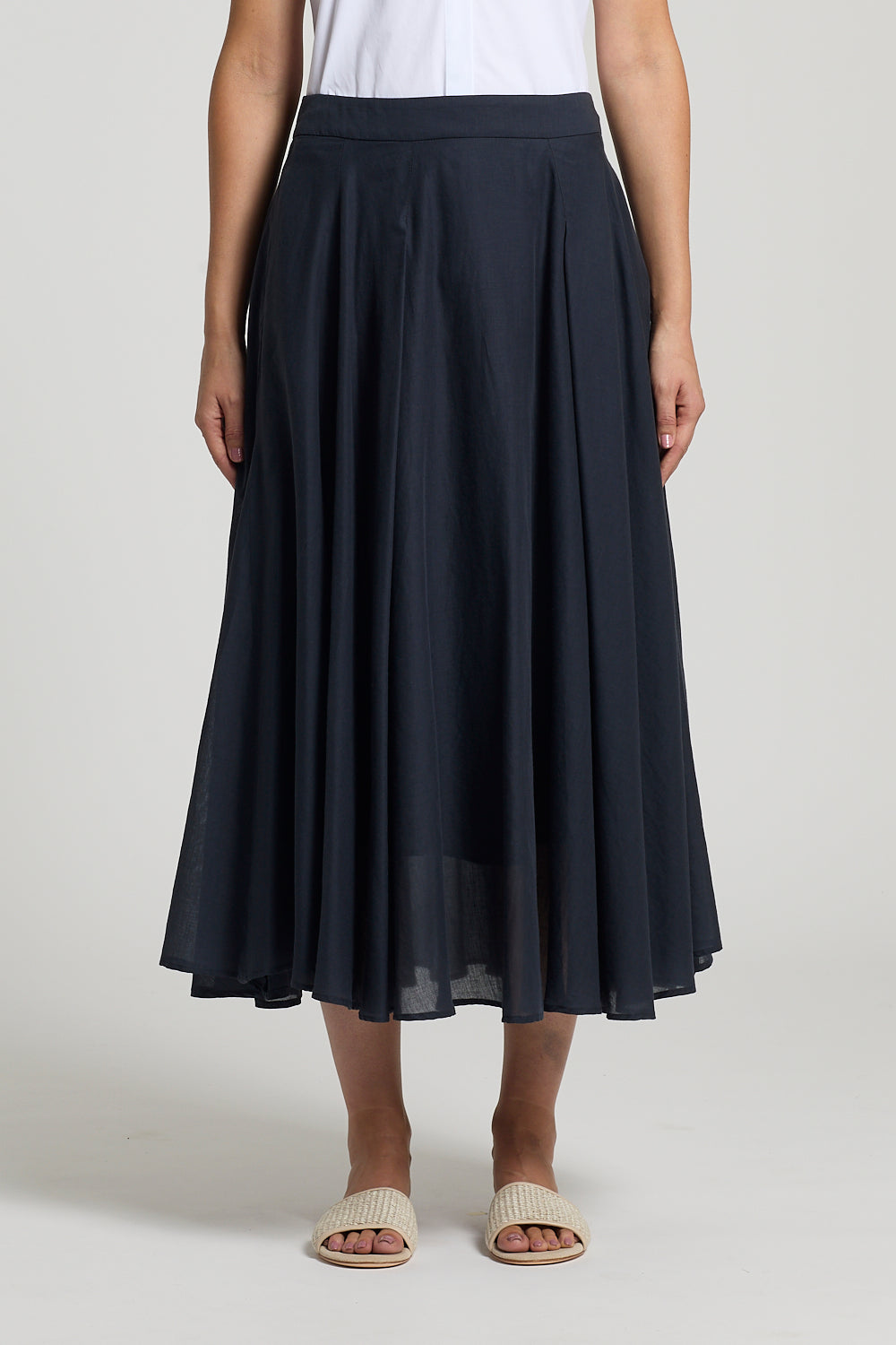 Pleated midi skirt in navy from Peserico, SS26 collection, with layered sheer hem